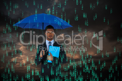 Composite image of portrait of serious businessman holding blue umbrella and file