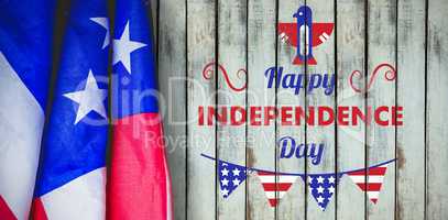 Composite image of digitally generated image of happy independence day text with decoration