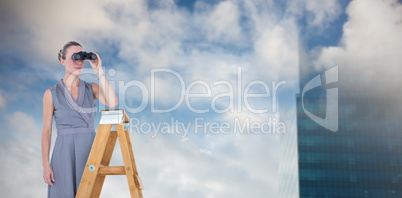 Composite image of businessman looking on a ladder