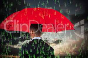 Composite image of rear view of businessman carrying red umbrella