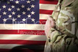 Composite image of mid section of military soldier taking oath
