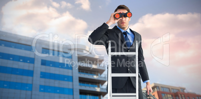 Composite image of businessman looking on a ladder