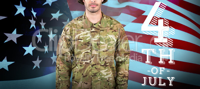 Composite image of portrait of confident soldier standing against white background