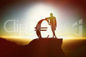 Composite image of silhouette beside euro symbol