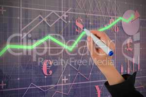 Composite image of businesswomans hand writing with marker