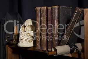 Old books and skull