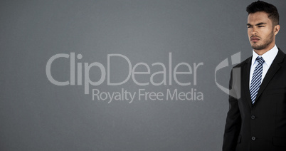 Composite image of thoughtful businessman standing Composite image of thoughtful businessman standing