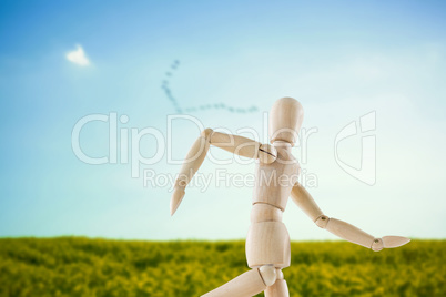 Composite image of 3d image of wooden figurine running