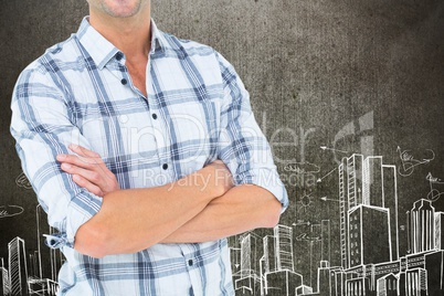 Businessman with crossed arms is standing on against cityscape drawing background