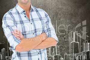 Businessman with crossed arms is standing on against cityscape drawing background