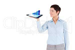 Businesswoman holding tablet computer projects hologram against white background