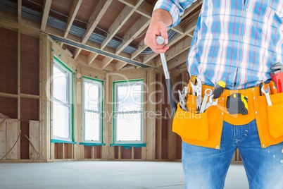 Handyman using his tools in construction site