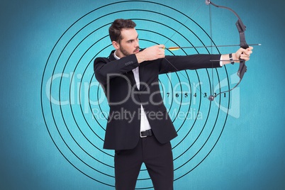 Businessman playing archery in blue background