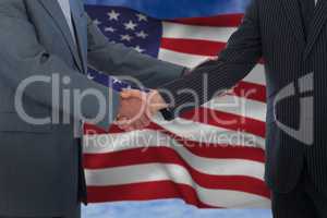 Composite image of handshake in agreement