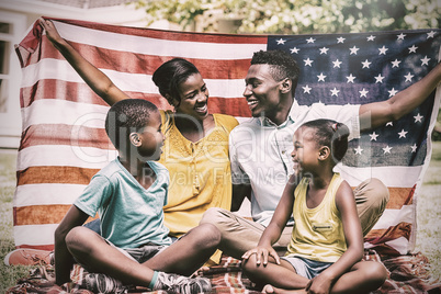 Happy family showing with USA flag