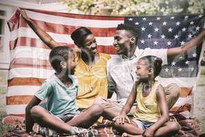 Happy family showing with USA flag