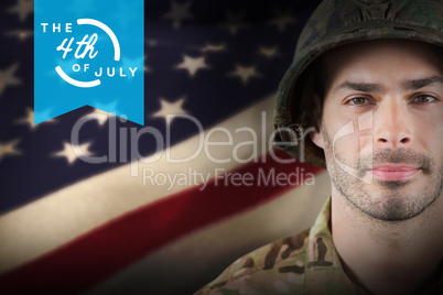 Composite image of close up of confident soldier wearing hard hat