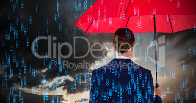 Composite image of rear view of businesswoman holding red umbrella