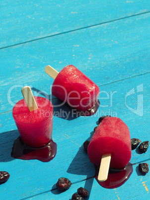 Homemade ice pops on garden table