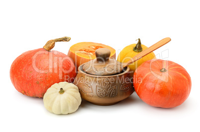 collection pumpkins and clay pot