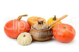 collection pumpkins and clay pot