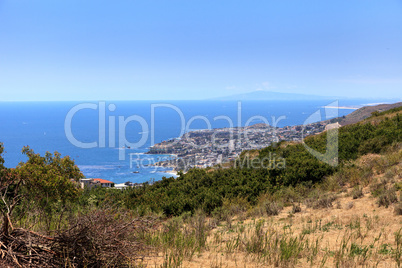 High hillside view of coastline of Laguna Beach with the ocean