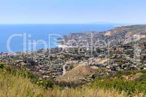 High hillside view of coastline of Laguna Beach with the ocean