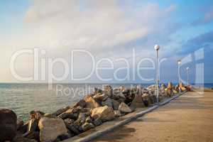 Breakwater with lampposts