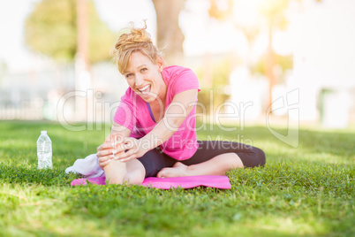 Young Fit Flexible Adult Woman Outdoors on The Grass With Yoga M