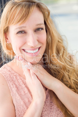 Outdoor Portrait of Young Adult Brown Eyed Woman.