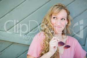 Outdoor Portrait of Young Adult Brown Eyed Woman With Sunglasses