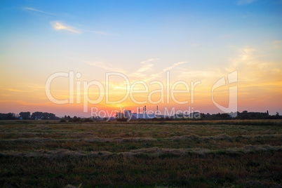 Sunset and rural meadow
