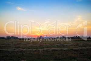 Sunset and rural meadow