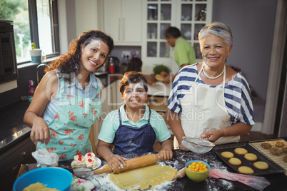 Family preparing dessert in kitchen