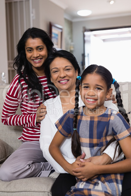 Portrait of smiling multi-generation family in row