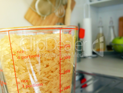 White rice in measuring cup