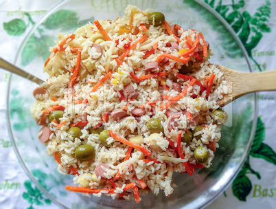 Appetizing healthy rice with vegetables in a glass plate