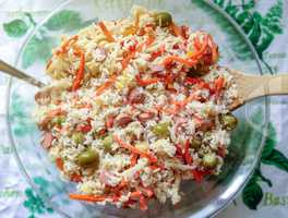 Appetizing healthy rice with vegetables in a glass plate