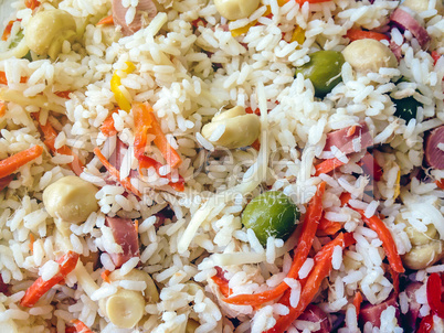 close up of italian rice salad with mushrooms, tuna, carrots, olives and corn
