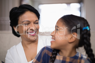 Smiling woman with granddaughter