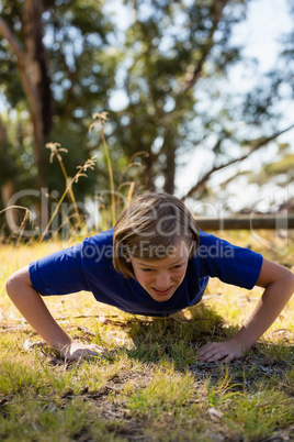 Girl exercising during obstacle course training