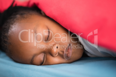 Close up of girl sleeping on bed