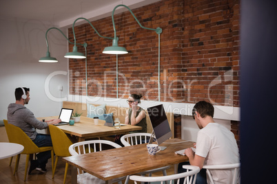 Executives working at desk in office