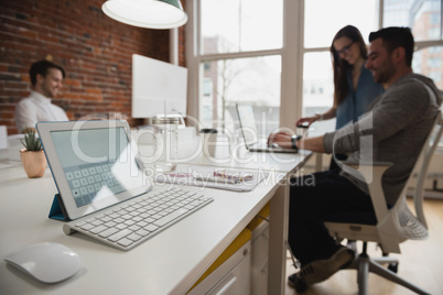 Digital tablet on desk