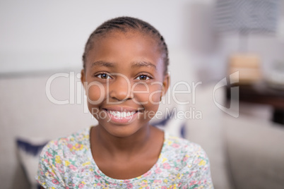 Portrait of smiling girl at home