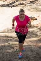 Woman jogging in the boot camp