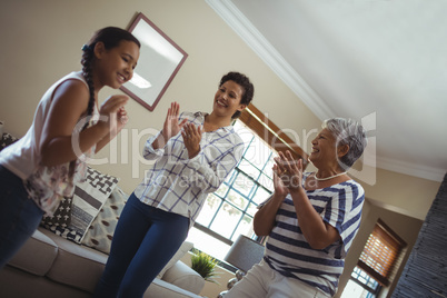 Happy family having fun in living room