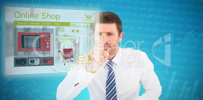 Composite image of businessman pointing with his finger