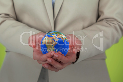 Composite image of womans hands cupped