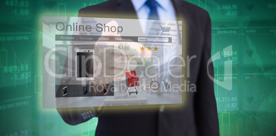 Composite image of businessman pointing his finger at camera